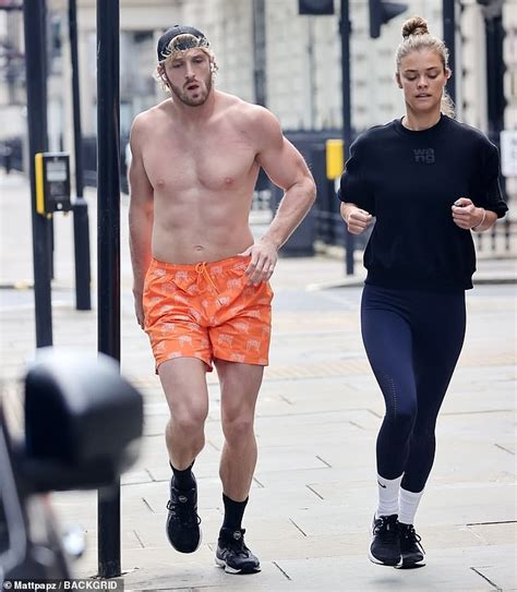 Logan Paul Shows Off His Toned Physique As He Jogs Shirtless In London With Girlfriend Nina