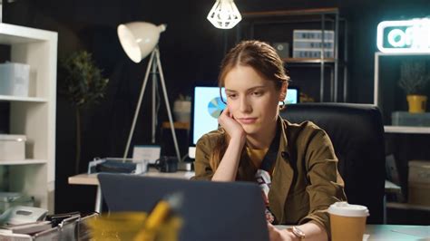 Stressful Woman Working On Laptop Computer At Working Place Sleepy