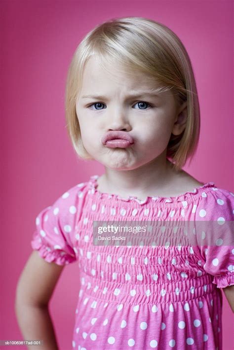 Girl Pouting Portrait High Res Stock Photo Getty Images