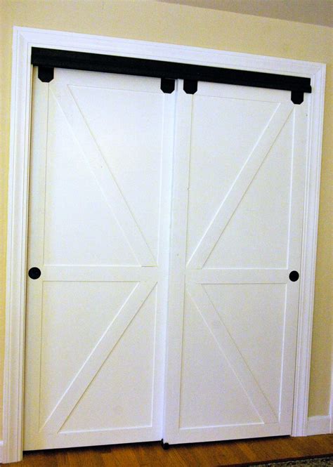 How to install bypass doors. How to Make Bypass Closet Doors Into Sliding Faux Barn ...