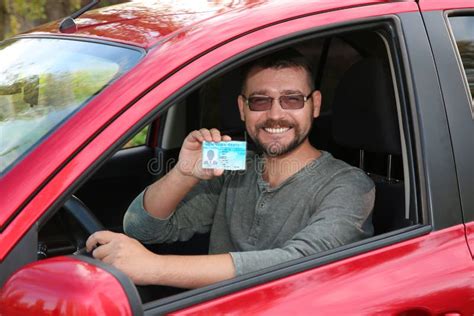 Happy Man Showing Driving License Stock Photo Image Of Learn Person