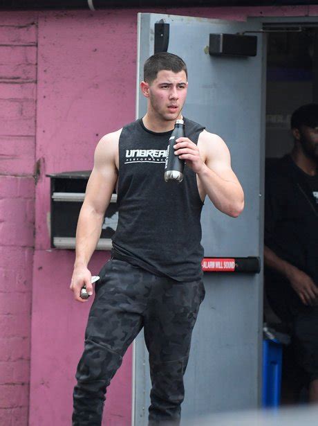 2017 omg nick shows off his arm muscles right after a workout nick jonas his capital