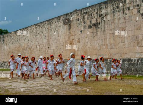 A Group Of Mayan Children Dance Group Running Through The Great Ball