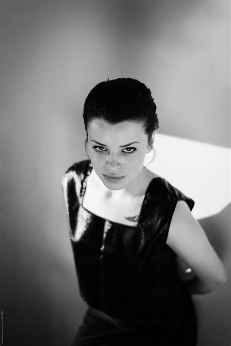 "Portrait Of Sensual Woman With Beautiful Light On Her Face" by Stocksy