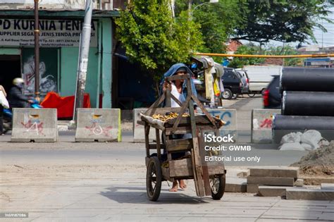 Man Pushing A Street Cart Selling Bananas In Fatahillah Square In Kota Tua Jakarta Indonesia