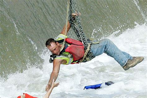 captured construction worker rescues drowning woman uk