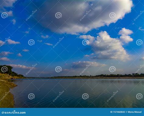 A Combination Of Sky River And Soil Blue Sky Touches The Artist S