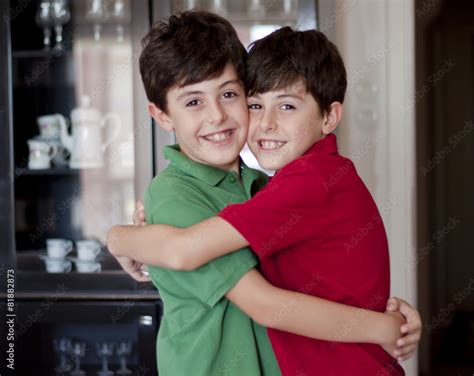 Two Little Boys Hugging Stock Photo Adobe Stock