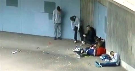 Shocking Footage Shows People Slumped Against A Wall Unable To Move