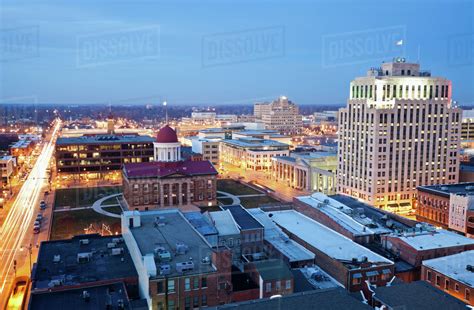 USA, Illinois, Springfield, City illuminated at dusk - Stock Photo ...