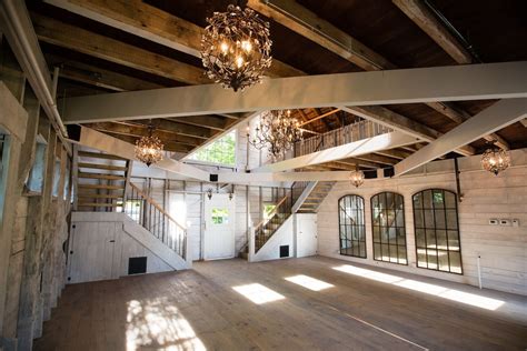 Kentish barn next to cooling castle for weddings and wedding receptions. Inside Peek: Hardy Farm - Rustic Weddings