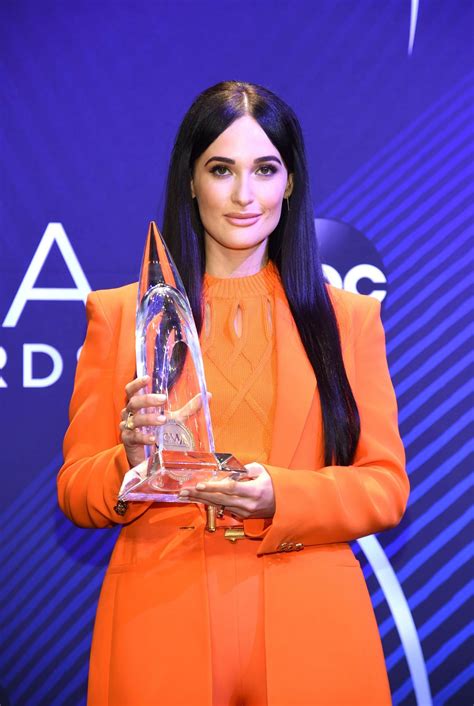 Km + boy smells slow burn candle. KACEY MUSGRAVES at 2018 CMA Awards in Nashville 11/14/2018 ...