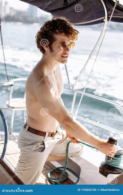 Captain Sail Boat Working On The Boat With Winch On A Sailboat Stock Photo Image Of Easeout