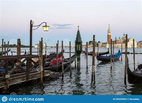 Gondola Boats On The See With The Church Of San Giorgio Maggiore Stock