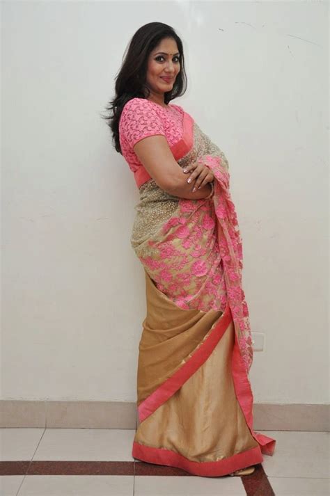 Tv Anchor Jhansi Photos In Pink Transparent Netted Designer Saree