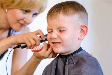 Young Boy Getting A Haircut Stock Image Image Of Shop Nervous 2668767
