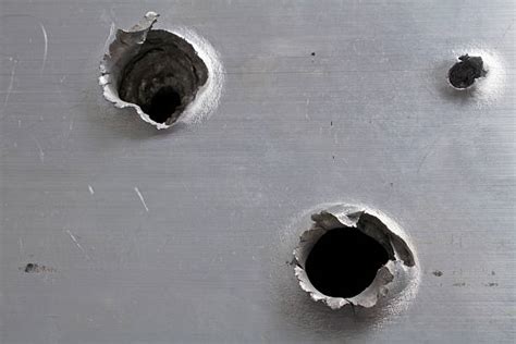Bullet Hole Stock Photos Pictures And Royalty Free Images Istock