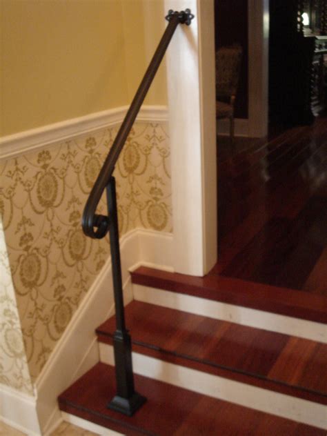 Between the top and the bottom of the stair railing. 3 Ft Wrought Iron Stair Hand Rail Wall/Post Mount Bracket & Decorative Post Interior or Exterior ...