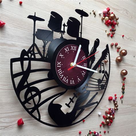If your looking for a classic clock design, it would be hard to go wrong with this very modern quartz wall clock with a traditional english. Guitar Drums Vinyl Record Design Wall Clock Rock Band ...