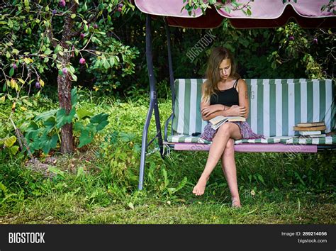 teen girl reads book image and photo free trial bigstock