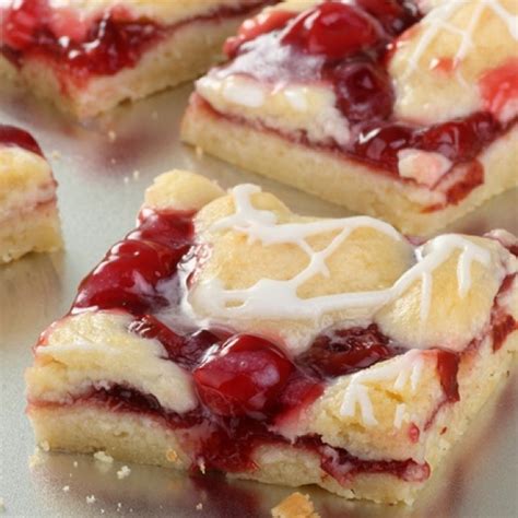 A Sweet And Delicious Recipe For Cherry Bars Topped With Yummy Icing