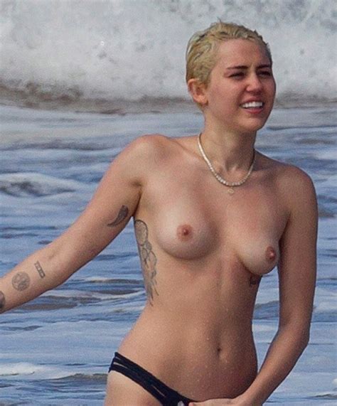 Celebrity Miley Cyrus Is Topless At The Beach