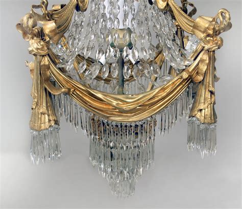 19th Century Gilt Bronze And Drop Crystal 15 Light Chandelier For Sale