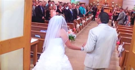 dad walks bride down aisle while sweetly serenading her metaspoon