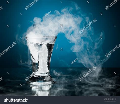 It takes 20 minutes to inhale a quarter of a shot. the alcohol without liquid (awol) machine vaporizes booze so customers can inhale it rather than drink it. Shot Glass Of Vodka With Ice Vapor Stock Photo 158929940 : Shutterstock