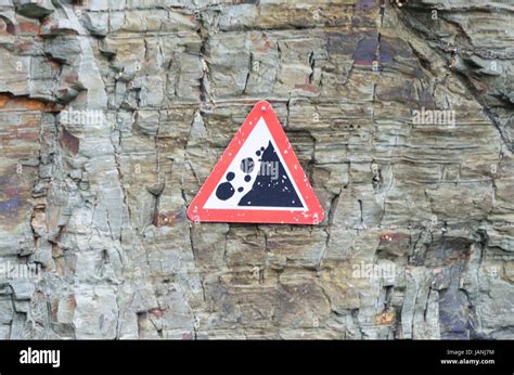 Rocks Falling Warning Sign On Cliff Stock Photo Alamy
