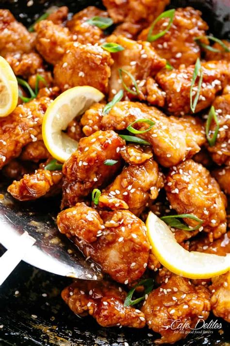 Chinese Lemon Chicken in a wok with crispy, golden chicken tenderloin