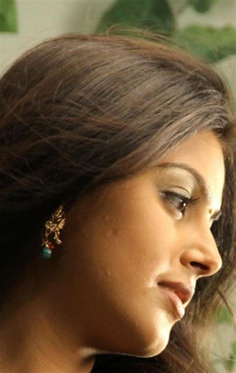 Actresses Monal Gajjar Hot Stills In Green Saree From Her Latest Telugu