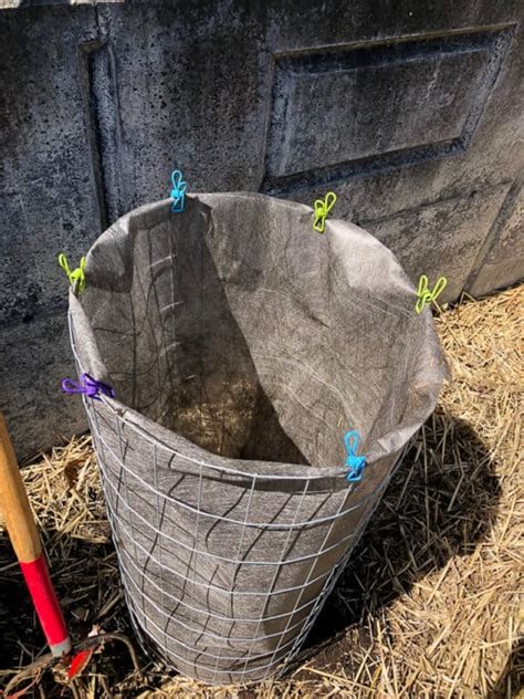 After remodelling my home lab i had some bamboo interlocking flooring pieces left ove… Vertical Strawberry Planter {DIY Strawberry Tower ...