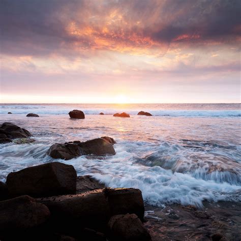 Download Wallpaper 2780x2780 Sunset Sea Waves Stones Landscape Ipad