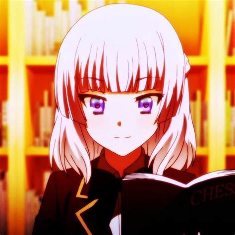 An Anime Character With Blonde Hair And Blue Eyes Reading A Book In