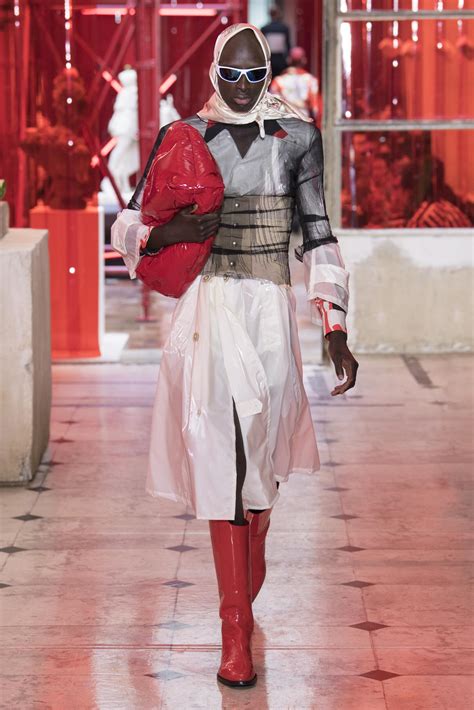 For the designer's spring/summer 2020 show, leon dame closed the show wearing a black belted jacket, cadet hat and knee boots. MAISON MARGIELA SPRING SUMMER 2019 MEN'S COLLECTION | The ...
