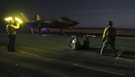 f 35c lightning ii aircraft are tested aboard uss abraham lincoln aircraft carrier flight
