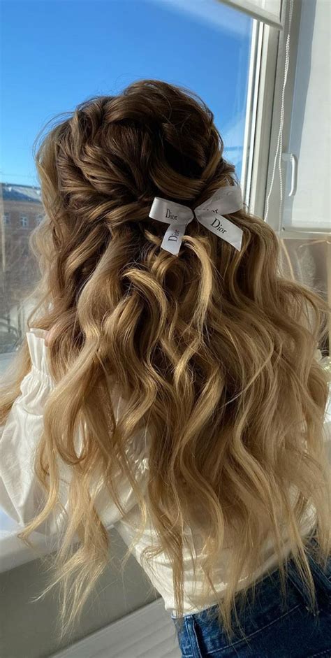 20 Beautiful Hairstyles To Wear In The Festive Season Textured Half Up Bow