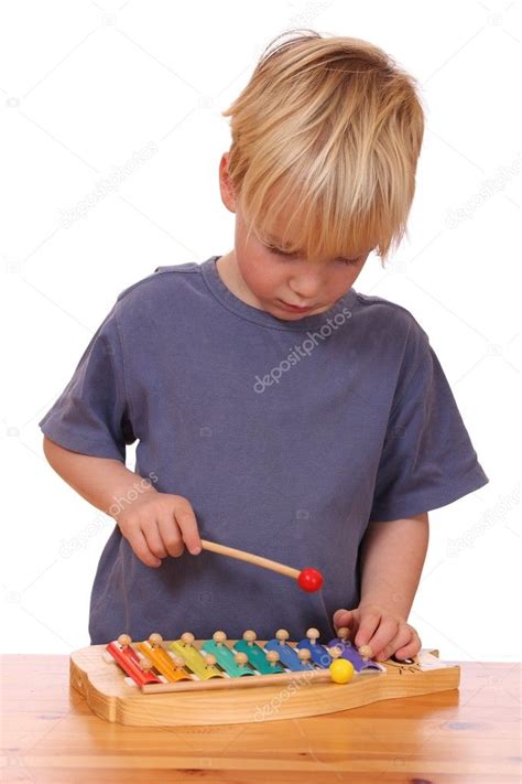 Boy Plays Xylophone Stock Photo By ©pahham 8146580