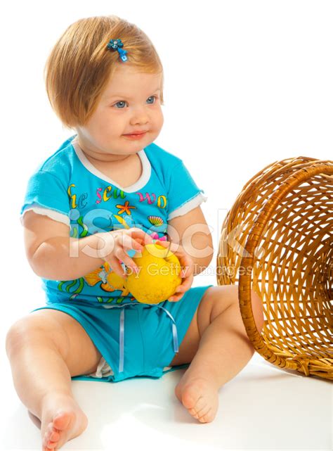 Baby Girl Holding Apple Stock Photos