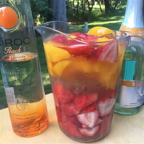 Peach Ciroc With Peach Sparkling Wine Mixed With Strawberries And Peaches Watermelon