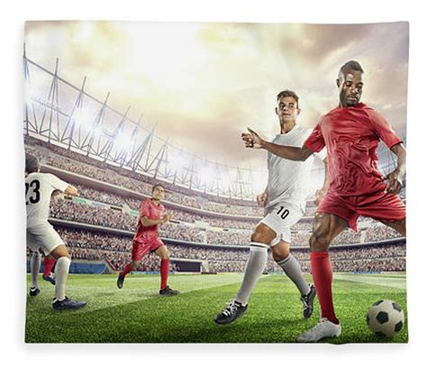 Soccer Player Kicking Ball In Stadium Fleece Blanket By Dmytro Aksonov