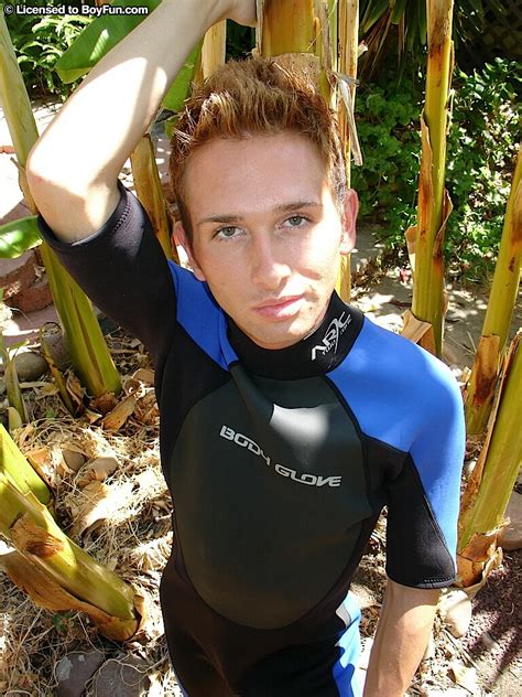 twink jayden holloway takes off his wetsuit and shows his dick in the garden