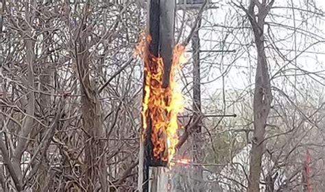 Utility Pole Fire With A Small Power Outage Near Robert Parker Coffin
