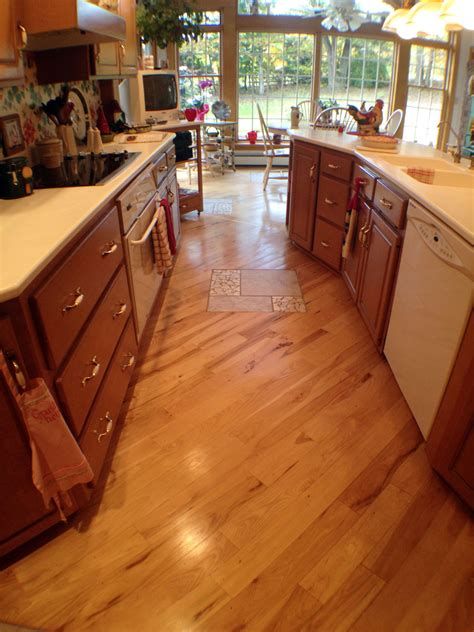 Heap of kitchen floor ideas that you can use. Designing Your Floor to Make Your Kitchen Feel Bigger! - Allegheny Mountain Hardwood Flooring