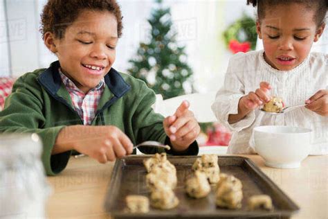 Black Children Baking Cookies Together Stock Photo Dissolve