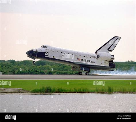 The Space Shuttle Orbiter Atlantis Touches Down On Runway 33 Of The Ksc