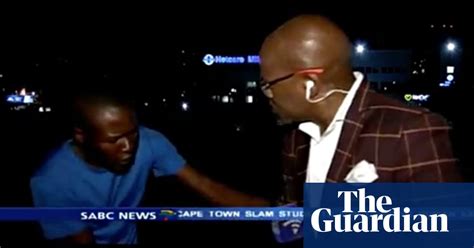 South Africa Journalist Mugged On Live Tv In Johannesburg Video World News The Guardian