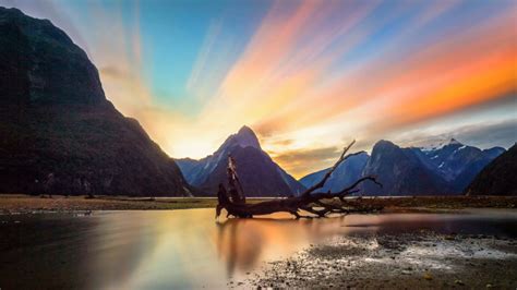 Milford Sound New Zealand Red Clouds On Sunset 4k Ultra Hd