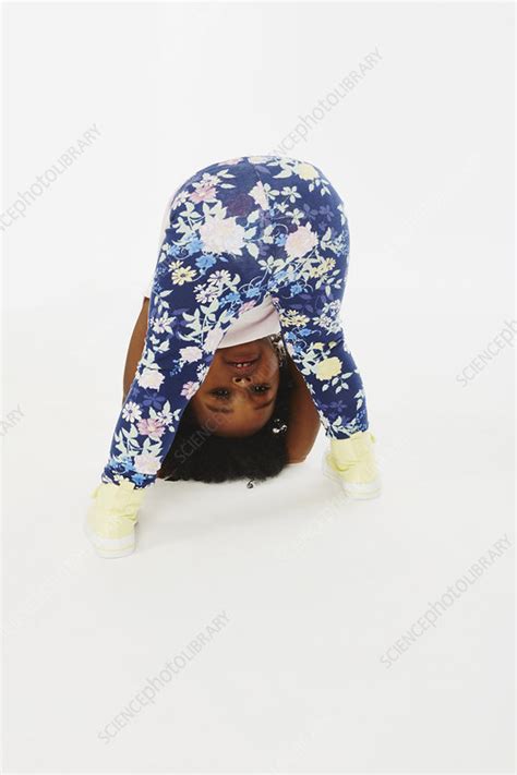 Little Girl Bending Over Stock Image C0533974 Science Photo Library